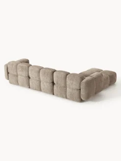Sofá modular de borreguillo bouclé con reposapiés Tayla (4 plazas)