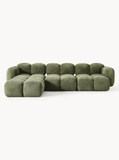 Sofá modular de borreguillo bouclé con reposapiés Tayla (4 plazas)