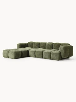 Sofá modular de borreguillo bouclé con reposapiés Tayla (4 plazas)