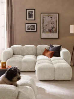 Sofá modular de borreguillo bouclé con reposapiés Tayla (3 plazas)