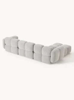Sofá modular en tejido bouclé con reposapiés Tayla (4 plazas)