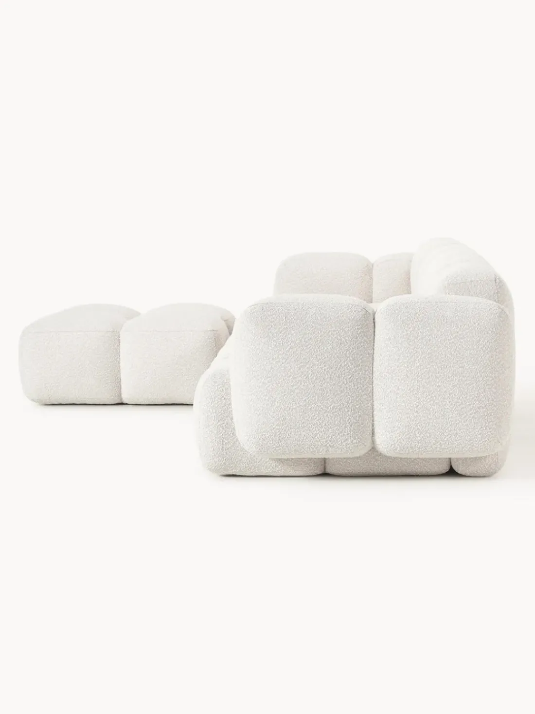 Sofá modular en tejido bouclé con reposapiés Tayla (4 plazas)