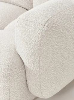 Sofá modular en tejido bouclé con reposapiés Tayla (4 plazas)