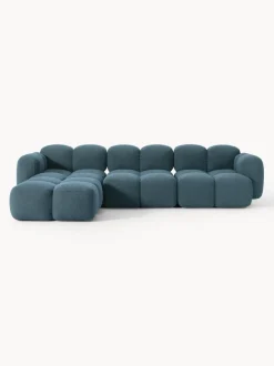Sofá modular en tejido bouclé con reposapiés Tayla (4 plazas)