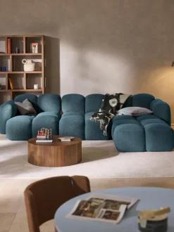 Sofá modular en tejido bouclé con reposapiés Tayla (4 plazas)