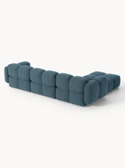 Sofá modular en tejido bouclé con reposapiés Tayla (4 plazas)