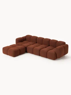 Sofá modular en tejido bouclé con reposapiés Tayla (4 plazas)