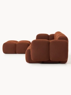 Sofá modular en tejido bouclé con reposapiés Tayla (4 plazas)
