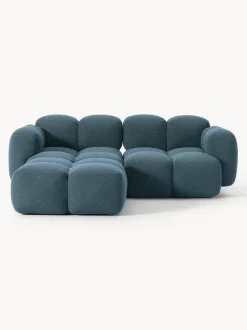 Sofá modular en tejido bouclé con reposapiés Tayla (3 plazas)