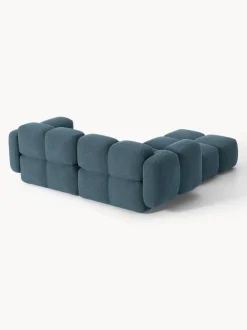 Sofá modular en tejido bouclé con reposapiés Tayla (3 plazas)