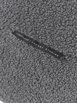 Westwing | Crosby Studios, cojín redondo en tejido bouclé Celeste, Ø 50 cm